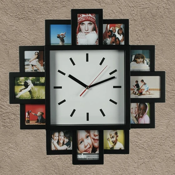 Ura s črnimi okvirji za fotografije z belim številčnikom